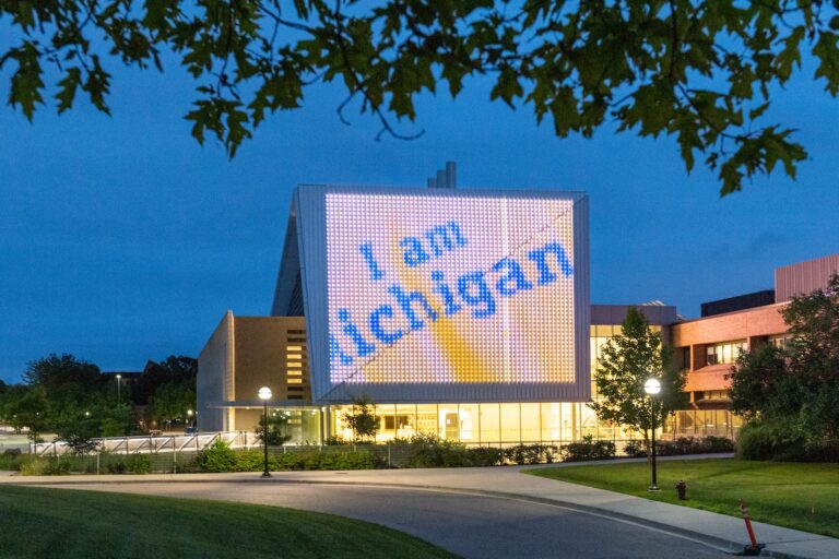 "I am Michigan" LED sign on building.